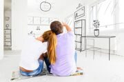 23878059-couple-at-their-new-empty-apartment-Stock-Photo